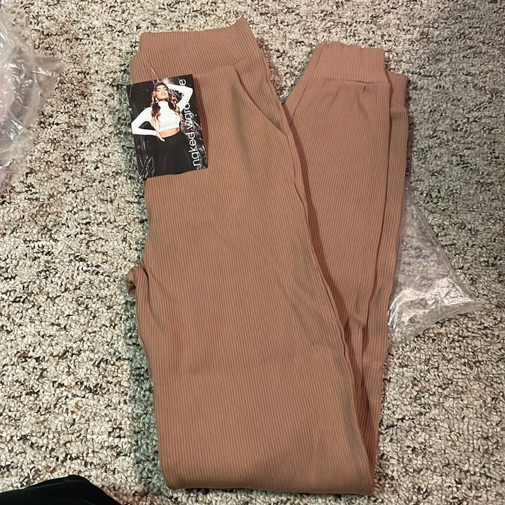 BNWT naked wardrobe joggers. Beige. With pockets. Size Med